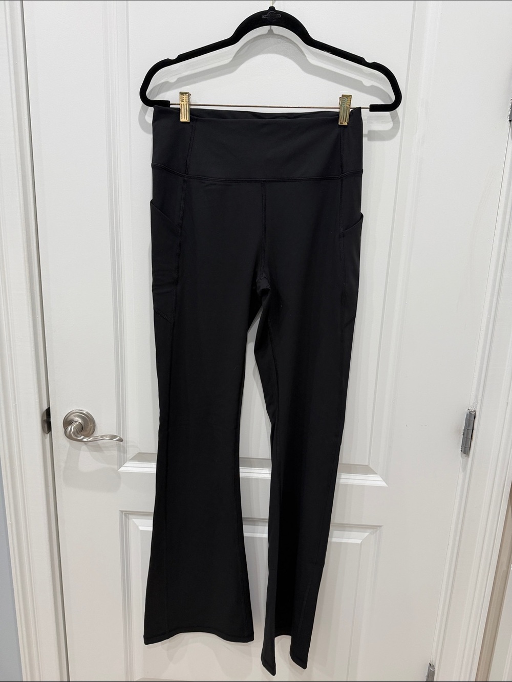 Fabletics Black High-Rise Bootcut Leggings with Side Pockets